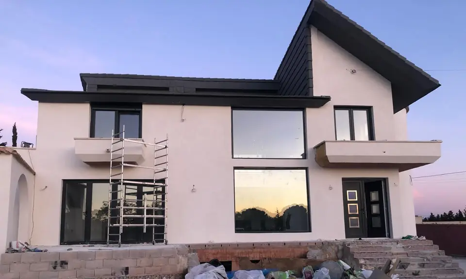 Front of a modern villa in Spain after external render