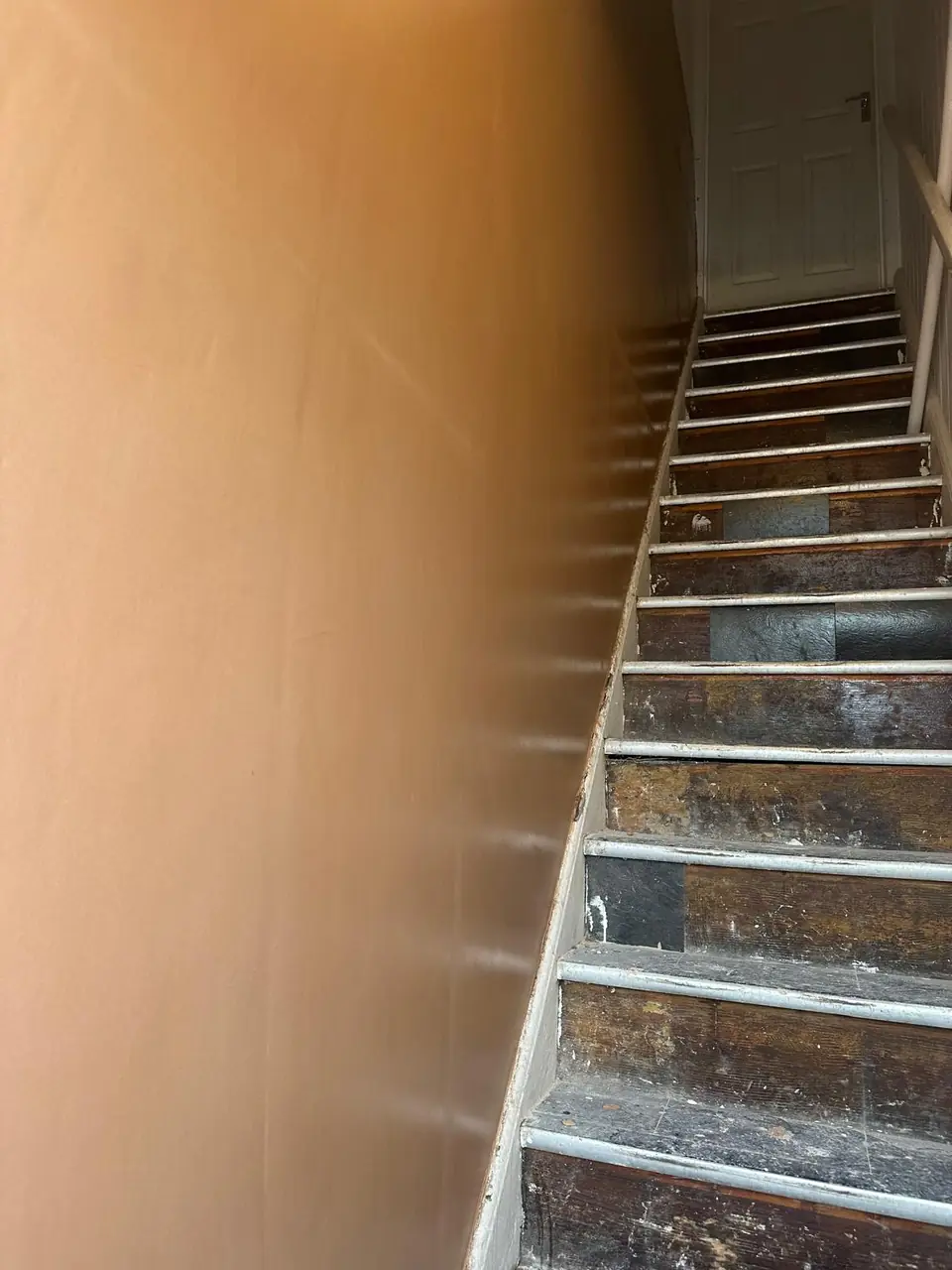Stairwell finished in smooth, breathable cork plaster